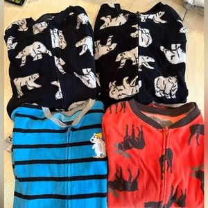 EUC Carter’s Footed One Piece Pajamas 4 in total